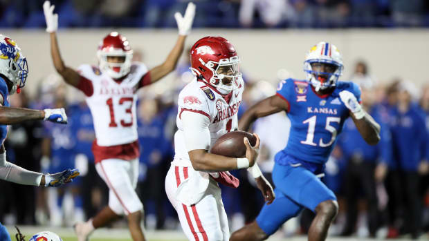 Arkansas Razorbacks quarterback KJ Jefferson (1) rushes for a touchdown.